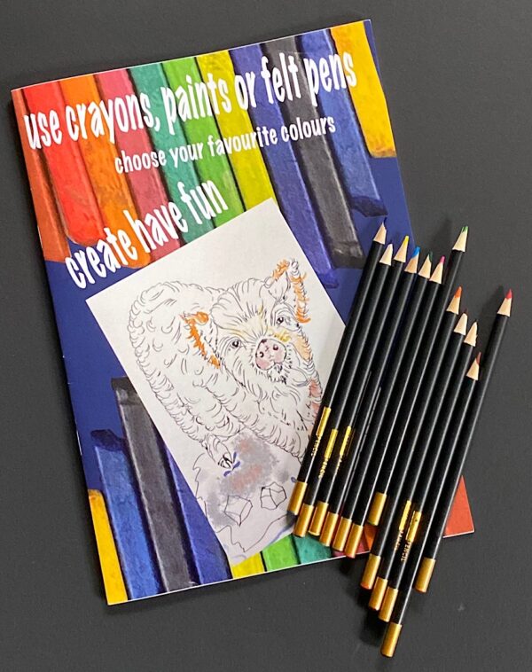 Picture showing colouring book and crayons