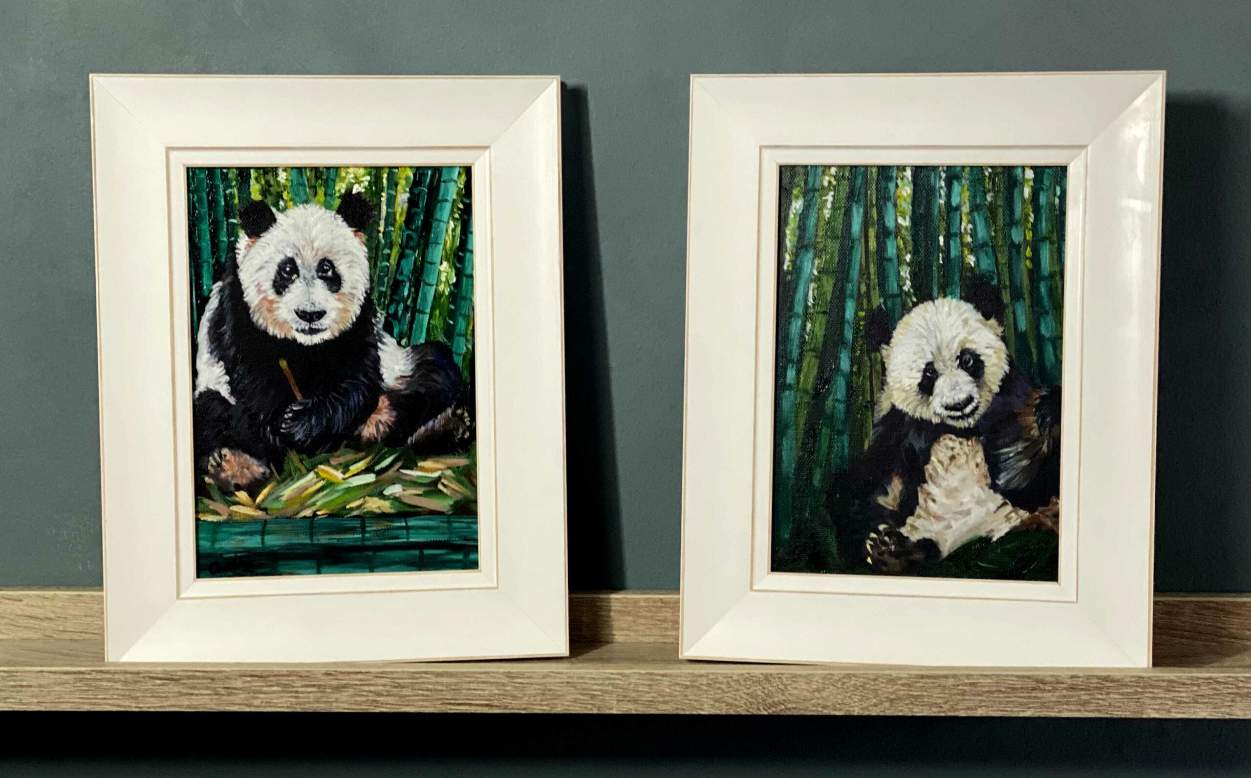Two pieces of artwork with Giant Pandas Pumpkin and Squash in the green bamboos