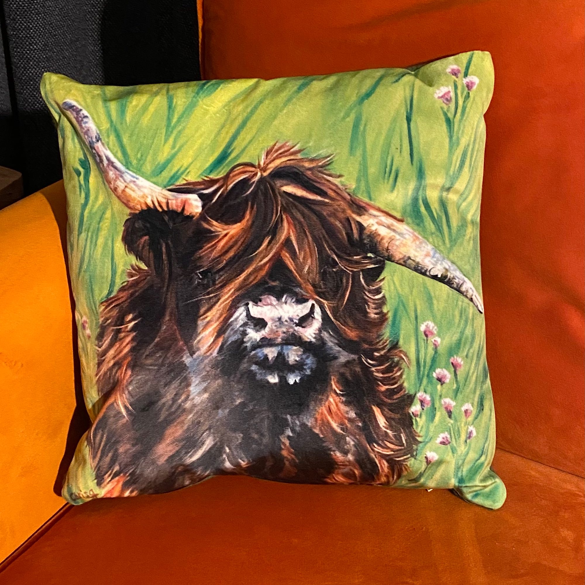 Brown highland cow on green background cushion soft velvet