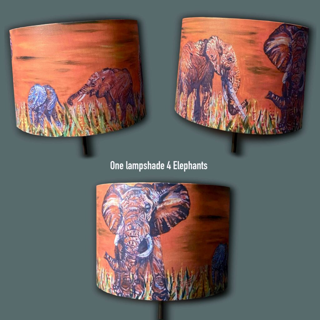 Family of 4 elephants printed around a drum lampshade. African scene orange background