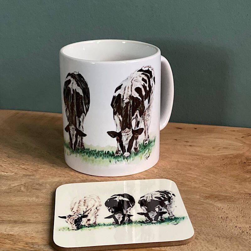Dairy lunch artwork on a mug and coaster
